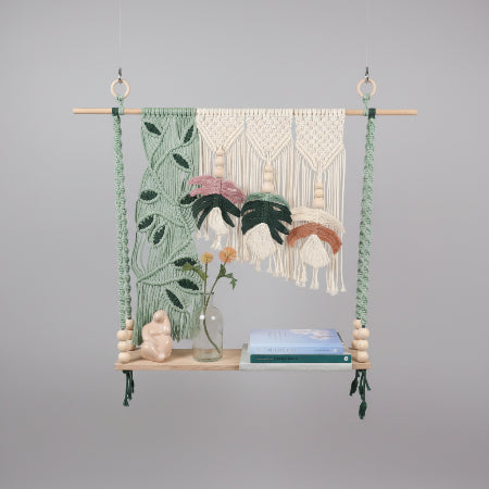 Twisted Threads Au Still Canopy Shelf made of functional fibre art, featuring a sleek hanging design with intricate woven details.