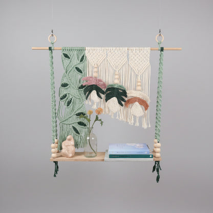 Twisted Threads Au Still Canopy Shelf made of functional fibre art, featuring a sleek hanging design with intricate woven details.