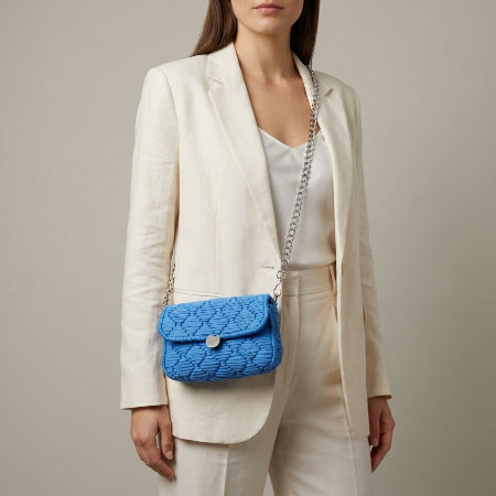 Yellow Threadline 05 sapphire mini clutch handbag by Twisted Threads Au with a sleek design and compact size.