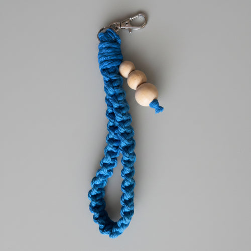 Yellow Twisted Threads Au large square knot wristlet keychain from the keychain collection, featuring a stylish woven design.