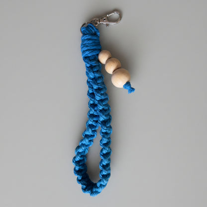 Yellow Twisted Threads Au large square knot wristlet keychain from the keychain collection, featuring a stylish woven design.