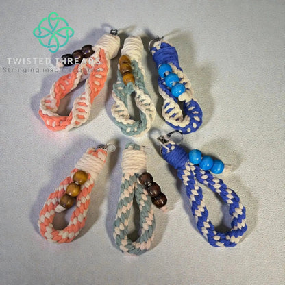 Sage green double spiral chunky loop keychain from Twisted Threads Au keychain collection with woven design and metal keyring.