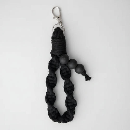 Beige Colour Drenched Wristlet Medium from Twisted Threads Au keychain collection, showcasing a textured fabric wristlet.