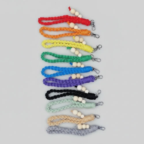 Large yellow Square Knot wristlet from Twisted Threads Au keychain collection, featuring a woven design and compact size.