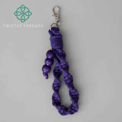 Beige Colour Drenched Wristlet Medium from Twisted Threads Au keychain collection, featuring a stylish and functional design.