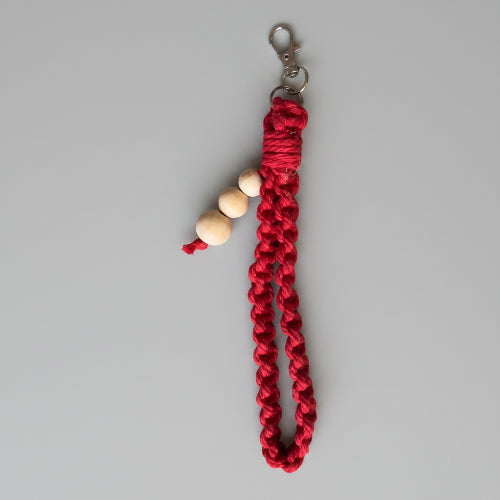 Yellow large square knot wristlet keychain from Twisted Threads Au keychain collection, featuring woven design and sturdy loop.