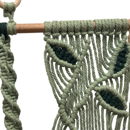 Close-up of Twisted Threads Au Still Canopy Shelf featuring intricate fibre art leaf panel design.