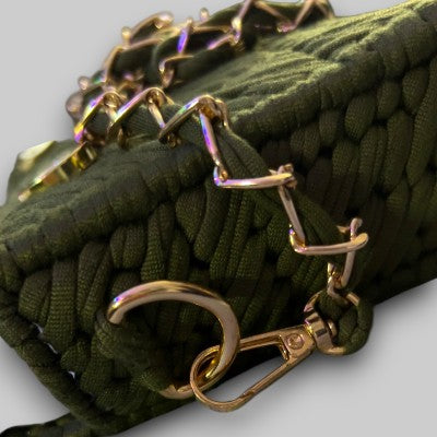 Close-up of the hardware on the Threadline 06 Olive Milanese Convertible Clutch by Twisted Threads Au, showcasing its elegant design.