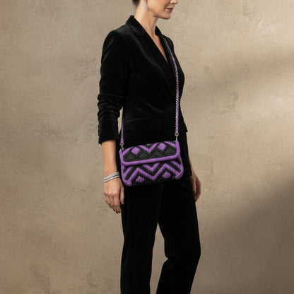 Purple Haze Threadline 10 by Twisted Threads Au, vibrant purple embroidery thread spool on a studio background.