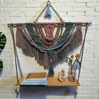 Stillwater Macrame Shelf by Twisted Threads Au, a stylish fibre art wall shelf with intricate macrame details.