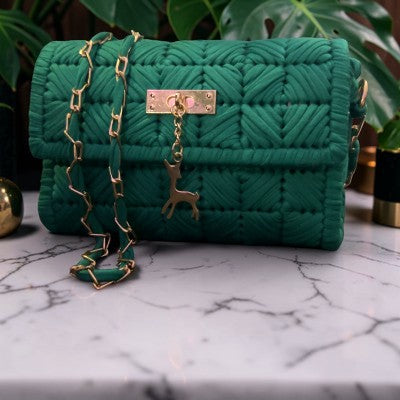 Twisted Threads Au Threadline Handbag in The Malachite Muse featuring a magnetic closure and vibrant green and blue tones.