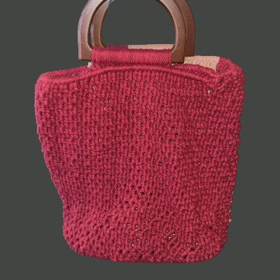 Twisted Threads Au Threadline 03 bucket handbag with press stud tab in tan leather, featuring a stylish, structured design.